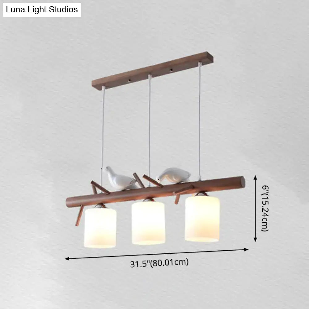 Wooden decorbites contemporary island pendant light with three cylindrical glass shades and e26 e27 sockets featuring white bird decor