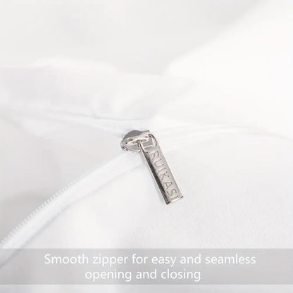 Silver metal zipper pull engraved rukasi on white cotton fabric of decorbites cooling summer cotton duvet cover set