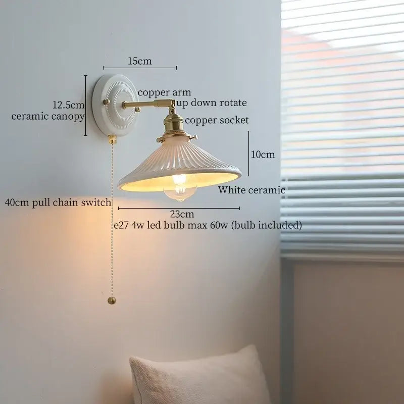 White ceramic wall lamp with fluted shade and brass-finished copper arm in decorbites copper arm vintage style