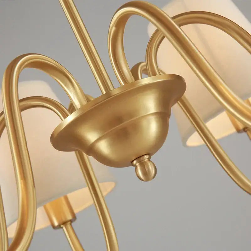 Gold-toned decorbites copper ceiling chandelier with curved arms and frosted fabric shades for living room use