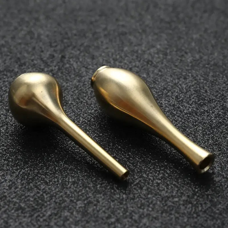 Two polished brass teardrop-shaped pipe bowls complementing decorbites™ pure copper gold tall vase for elegant home decor
