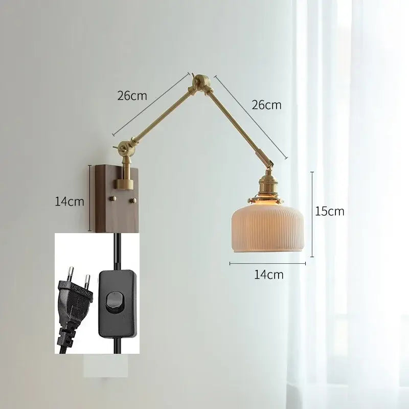 Brass-finished decorbites copper swing arm wall lamp with adjustable off-white ribbed glass shade for bedroom use