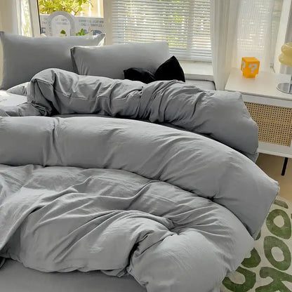 Decorbites cotton bedding set featuring a cozy plush gray cotton duvet cover with matching pillowcases and sheet