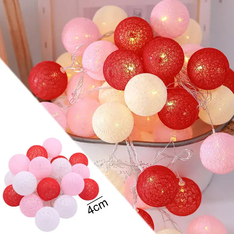 Decorbites™ cotton garland led string lights featuring spherical textured paper lanterns in red pink and cream hues