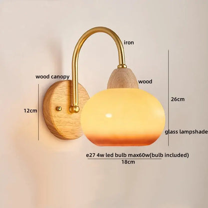 Warm-toned glass lampshade cotton led wall lamp with brass iron arm and wooden canopy by decorbites for bedroom use