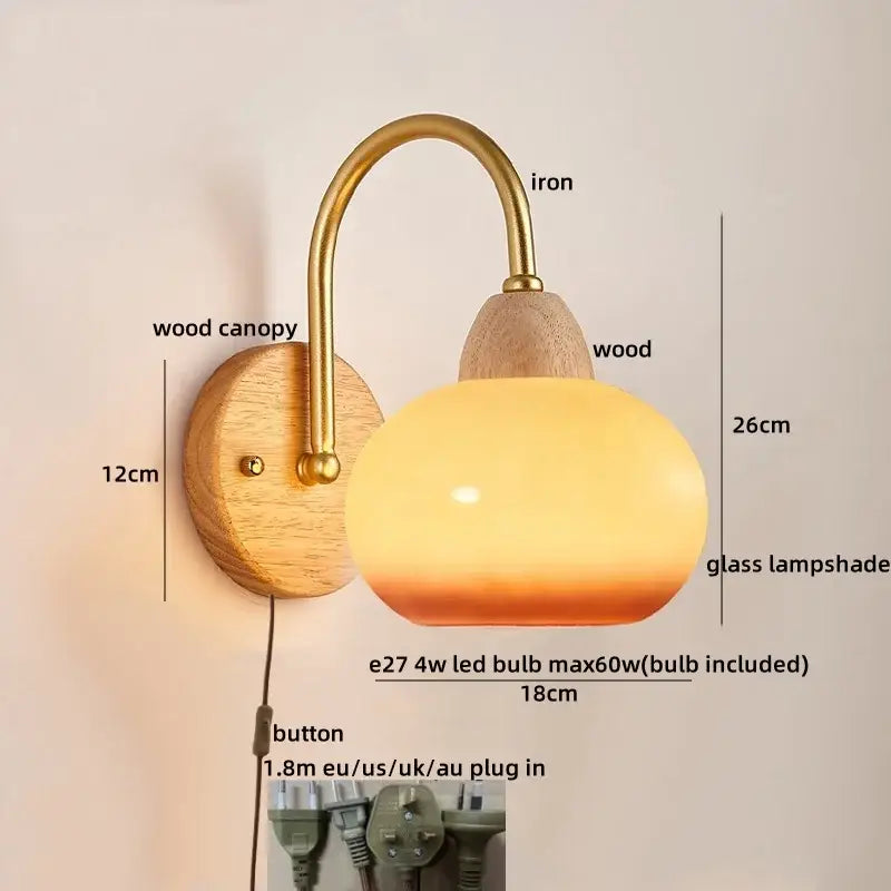 A warm-toned glass lampshade with brass iron arm and wooden canopy in a decorbites cotton led wall lamp cloud sconce