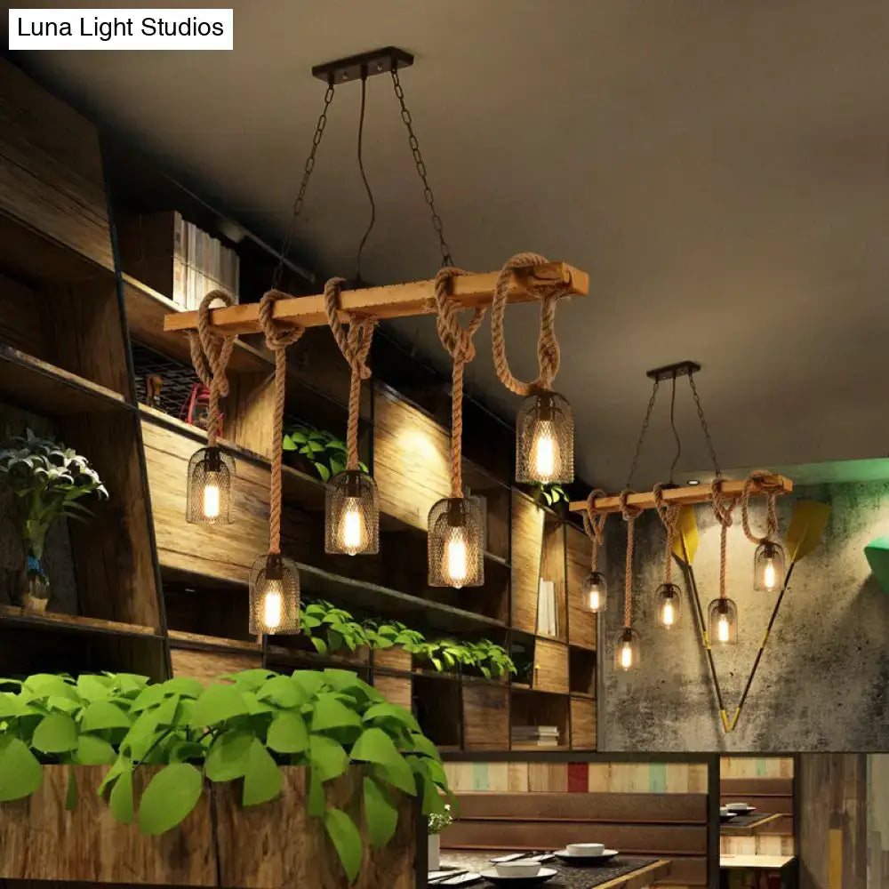 Rustic wooden beam pendant lamp with thick rope suspension and clear glass shades from decorbites countryside mesh hanging collection