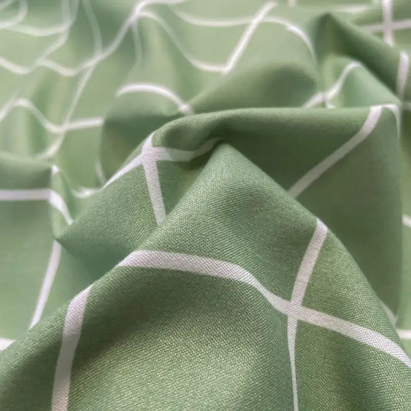 Soft sage green nordic plaid 1pc duvet cover with subtle white geometric lattice pattern in DecorBites cozy bedding set