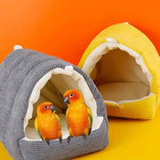 Gray corduroy decorbites cozy parrot cage hanging hut bed with white fleece lining and yellow version in background