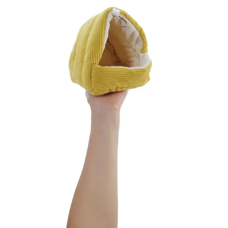Yellow corduroy DecorBites cozy parrot cage hanging hut bed with soft beige interior for bird cage parrot comfort