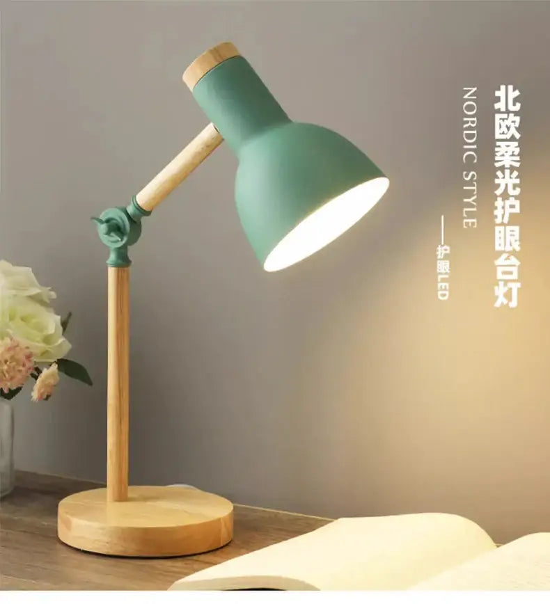 A mint green creative nordic table lamp with wooden base and adjustable head for focused reading light