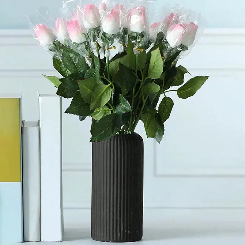 DecorBites™ creative striped plastic flower vase in dark brown holding pink and white floral arrangements with green leaves