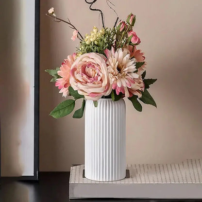 White ribbed ceramic flower vase holding pink and cream artificial floral arrangements for decorbites plastic flower vase