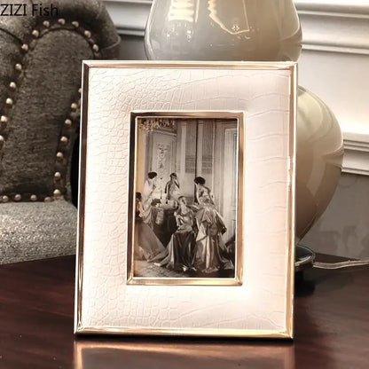 Cream-colored decorbites crocodile leather modern photo frame with gold-toned inner border for living room decor