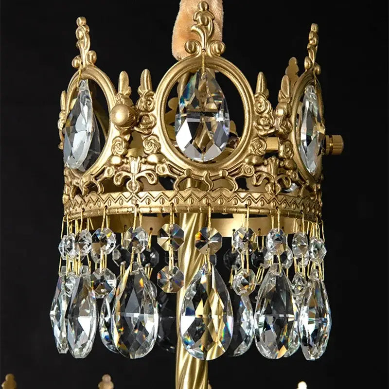 Decorbites crown crystal gold chandelier pendant light with clear crystal teardrops and ornate filigree detailing for bedroom