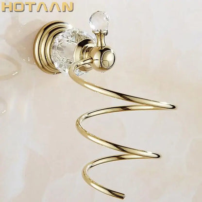 Gold-toned spiral stand with crystal accents and polished brass finish for Decorbites crystal bathroom hair dryer holder
