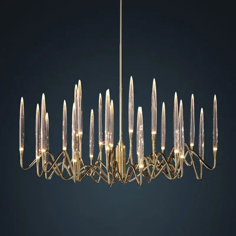 Gold-toned decorbites crystal branch chandelier with slender glass arms and intricate metalwork for dining room lighting