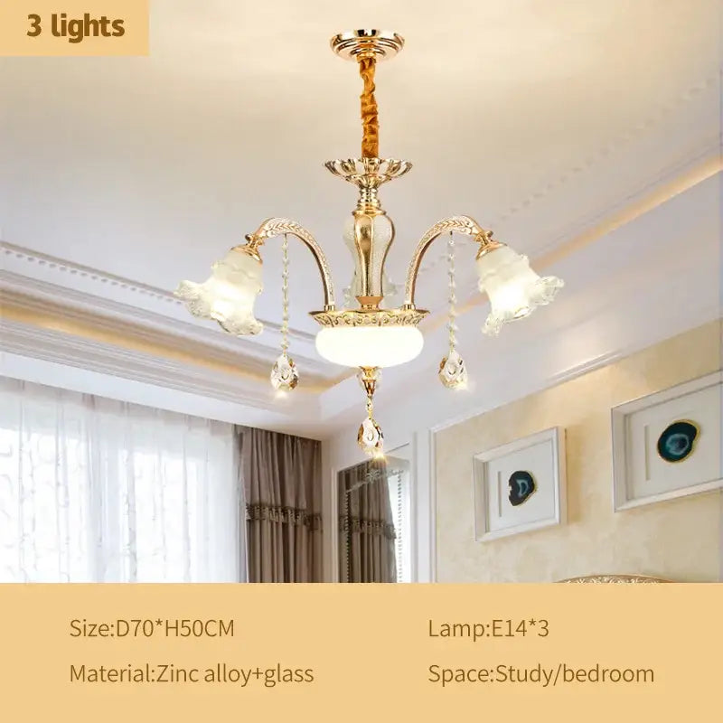 Gold-toned decorbites crystal ceiling chandelier with three frosted glass shades and crystal droplets in zinc alloy