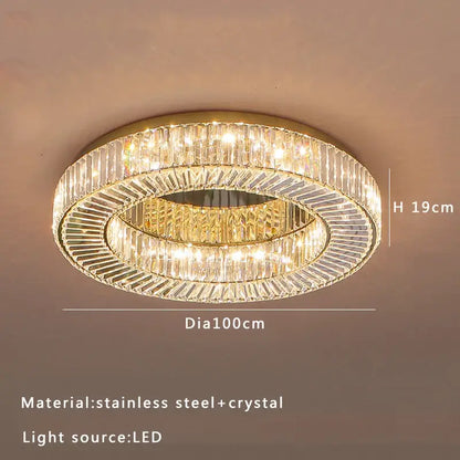 A decorbites crystal ceiling lamp with two faceted crystal rings and a gold stainless steel frame for luxury décor