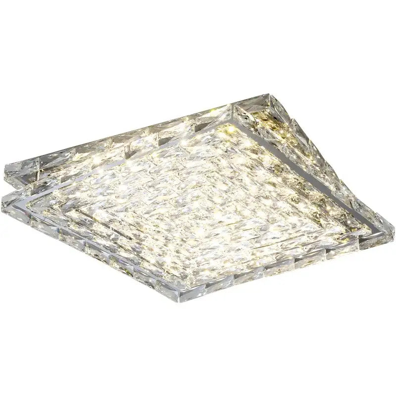 Clear geometrically faceted decorbites crystal ceiling lamp with embedded led grid emitting warm white glow for indoor use