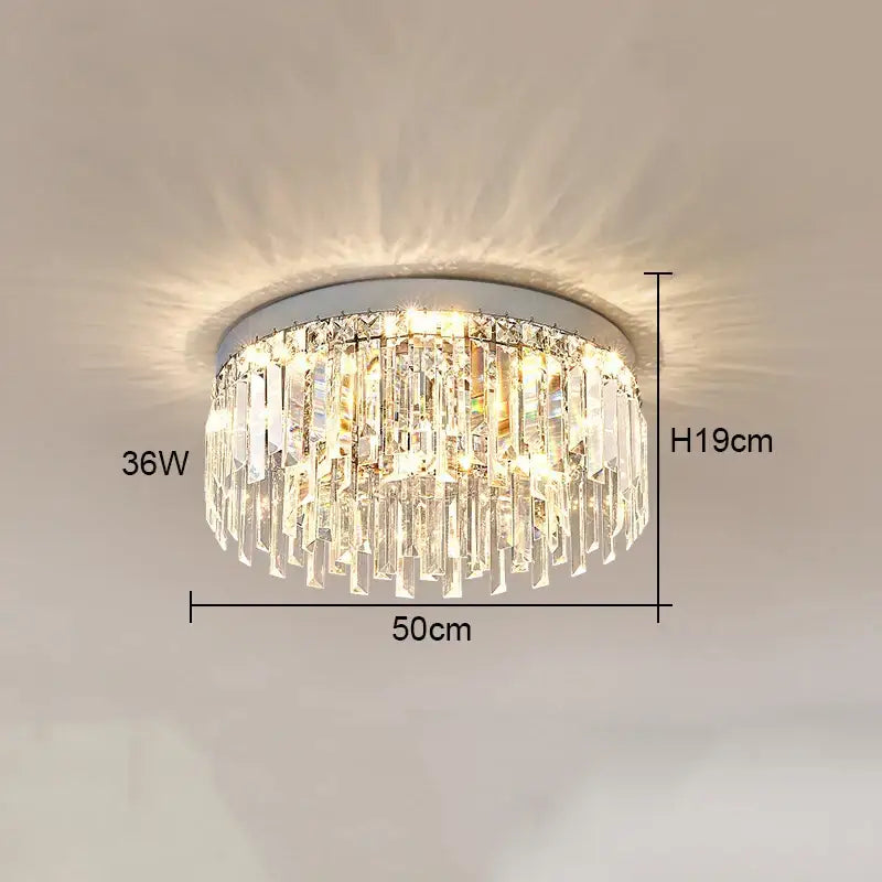 Decorbites crystal ceiling lamp with sleek silver base and cascading clear crystal prisms for modern indoor lighting