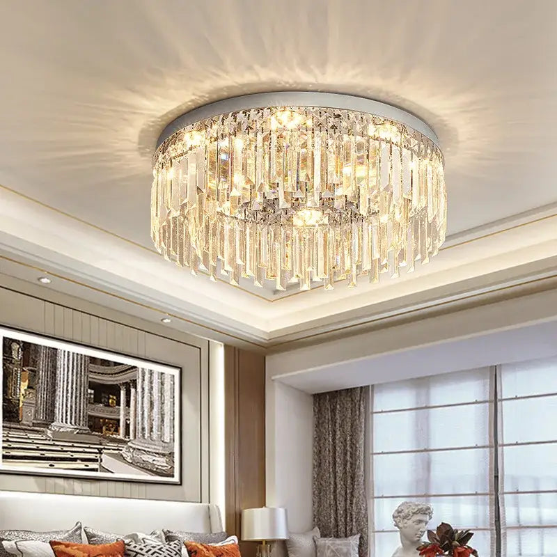 Decorbites crystal ceiling lamp with clear crystal prisms in cascading tiers on a sleek metallic frame for indoor use