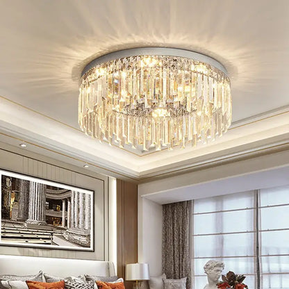 Decorbites crystal ceiling lamp with clear crystal prisms in cascading tiers on a sleek metallic frame for indoor use