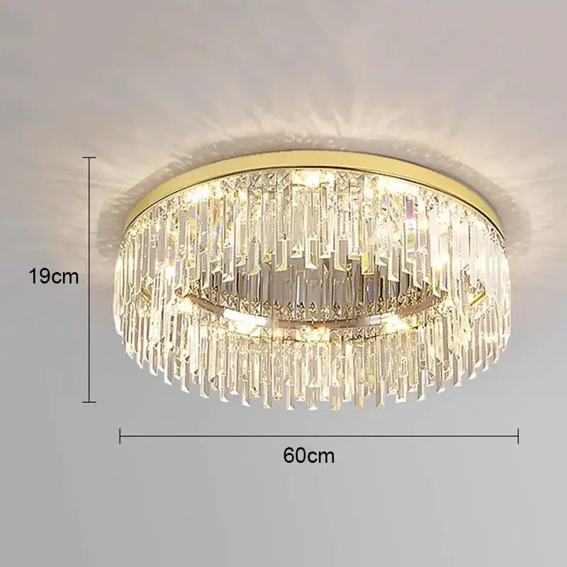 Gold-toned decorbites crystal ceiling lamp with cascading clear crystal prisms in a circular modern minimalist design