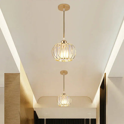 Gold-toned DecorBites crystal ceiling lamp with crystal cage design and warm glowing illumination for elegant home decor