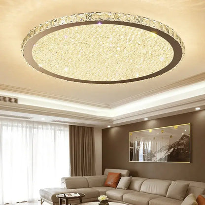 Decorbites crystal ceiling light with modern circular design, clear crystal accents, warm golden led illumination
