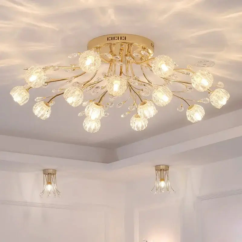 Gold-toned DecorBites crystal ceiling light with flower-like bulbs and dangling crystals for modern luxury spaces