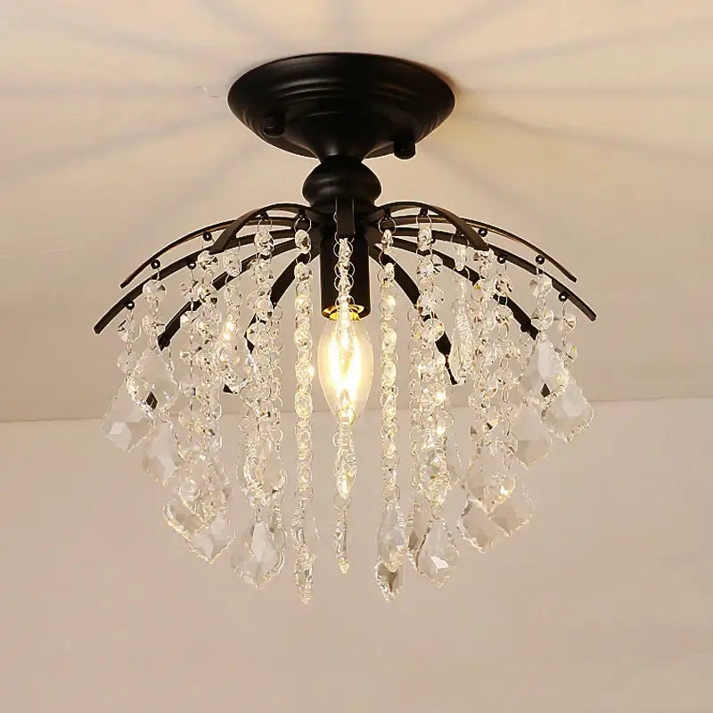 Black metal DecorBites crystal ceiling light with cascading clear crystal droplets and central exposed bulb for home living spaces