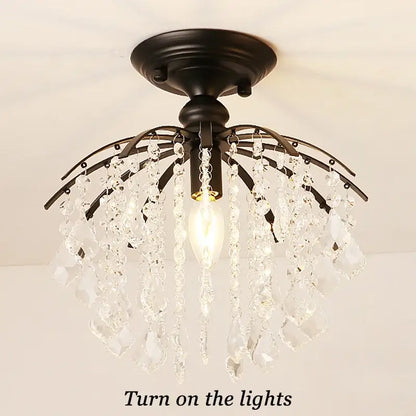 Black metal decorbites crystal ceiling light with cascading clear crystal droplets for modern luxury spaces