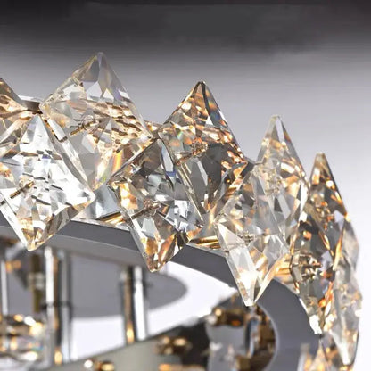 A decorbites crystal ceiling light with faceted clear crystal prisms in an elegant arc for modern living spaces