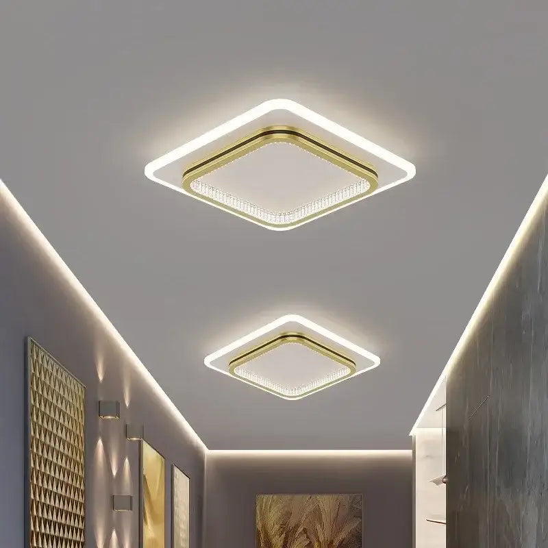 Square decorbites crystal ceiling light with gold-toned frame and illuminated crystal panel for modern indoor lighting