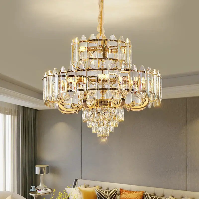 Decorbites crystal chandelier with gold-toned metalwork and clear glass prisms for living room dining room and bedroom use