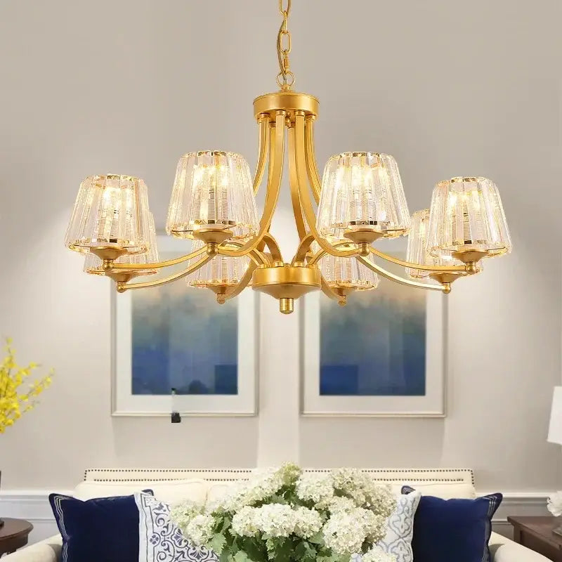 Gold-toned DecorBites crystal chandelier ceiling light with six faceted crystal shades for modern living spaces