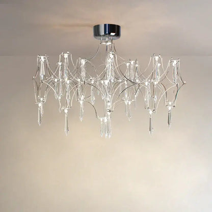 A modern chrome and crystal decorbites crystal chandelier pendant light with intricate branching design for home lighting