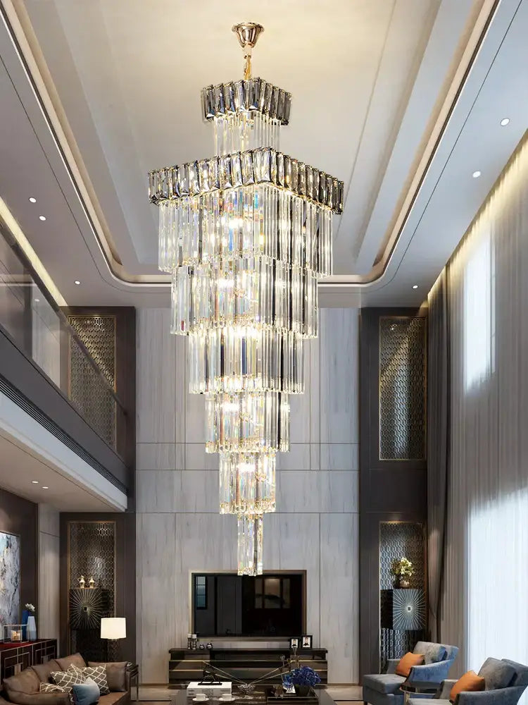 Decorbites crystal chandelier with gold-toned top and clear glass prisms hanging in elegant villa staircase room
