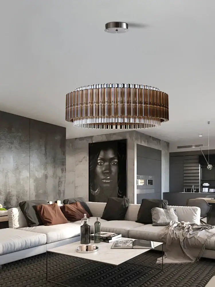A modern decorbites crystal chandelier with metallic frame and copper-toned glass rods for living room decor