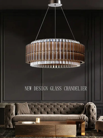 A decorbites crystal chandelier featuring two-tiered amber and clear cylindrical crystal rods in a chrome fixture