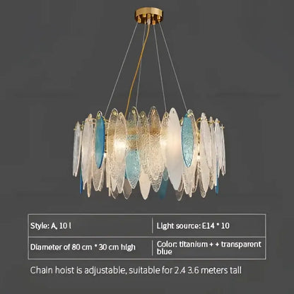 A decorbites crystal chandelier with a gold metal frame and blue glass shards in elegant european style design