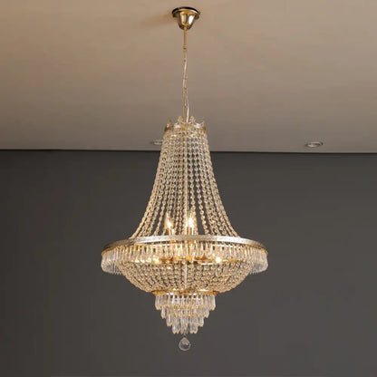 DecorBites crystal chandelier featuring a gold metal frame and cascading clear crystals for luxury living spaces
