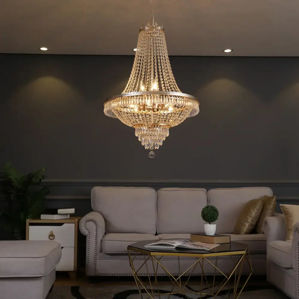 Decorbites crystal chandelier with gold-toned metal frame and clear faceted crystals for luxury living spaces