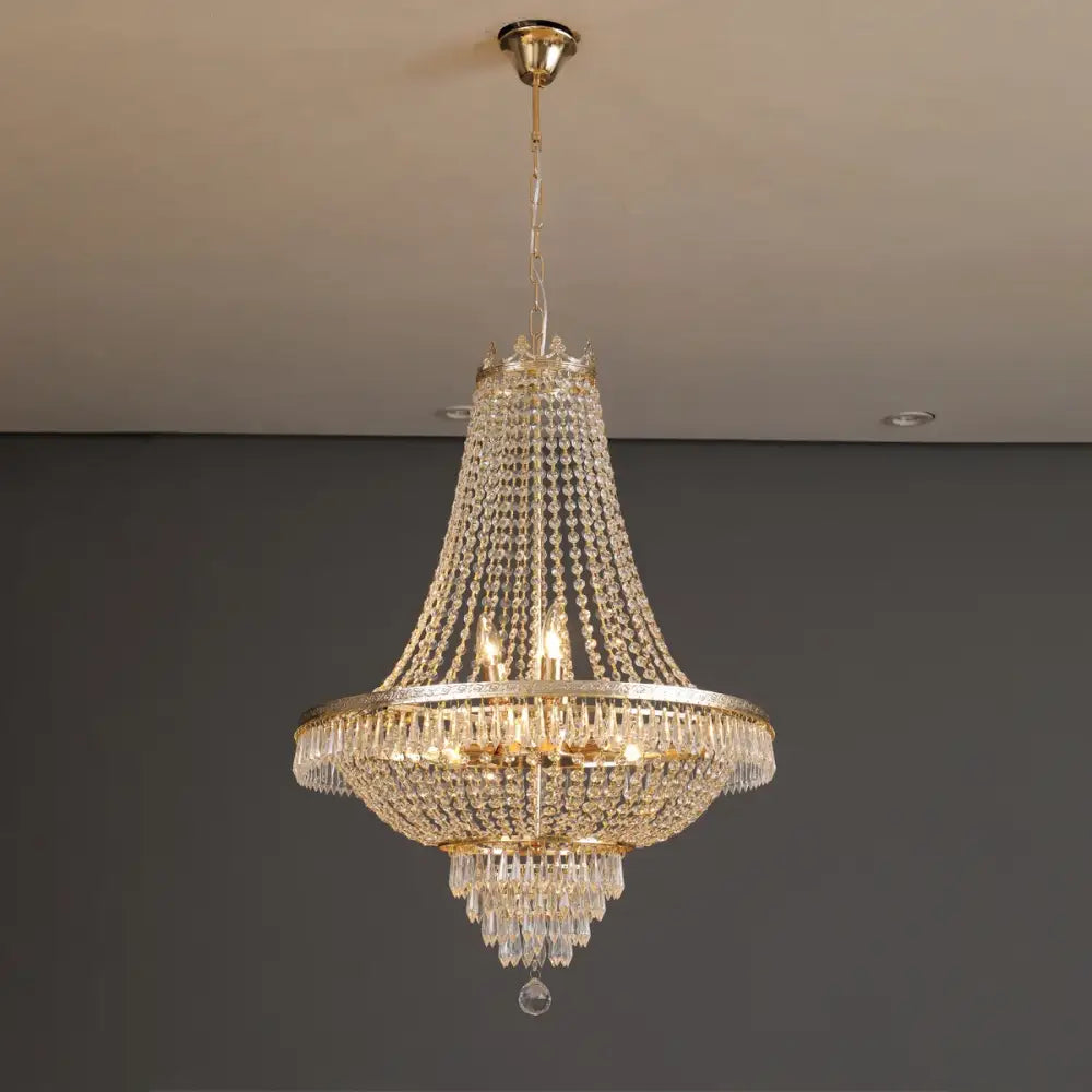 Decorbites crystal chandelier with gold metal frame and cascading clear crystals for elegant luxury living spaces