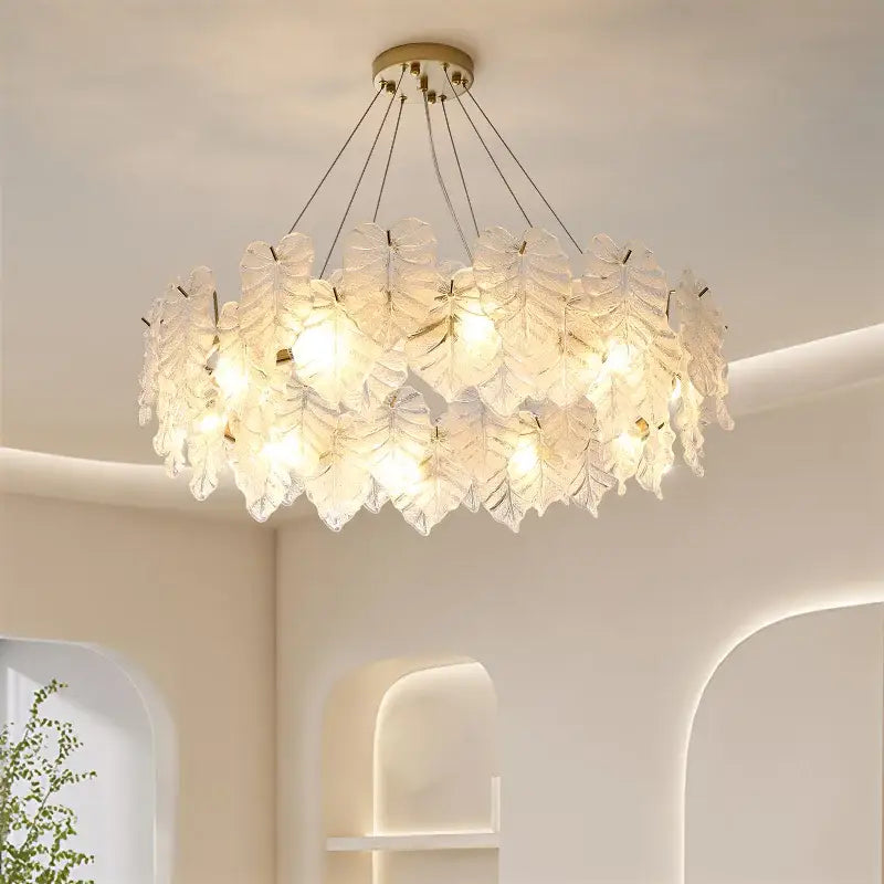Elegant white glass leaf decorbites crystal chandelier with gold-toned ceiling mount for living room and bedroom lighting