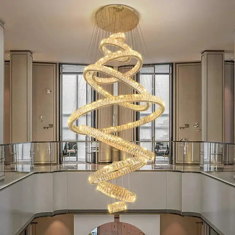 Golden spiral pendant light with crystal accents and warm led lighting by decorbites crystal chandelier for elegant living rooms