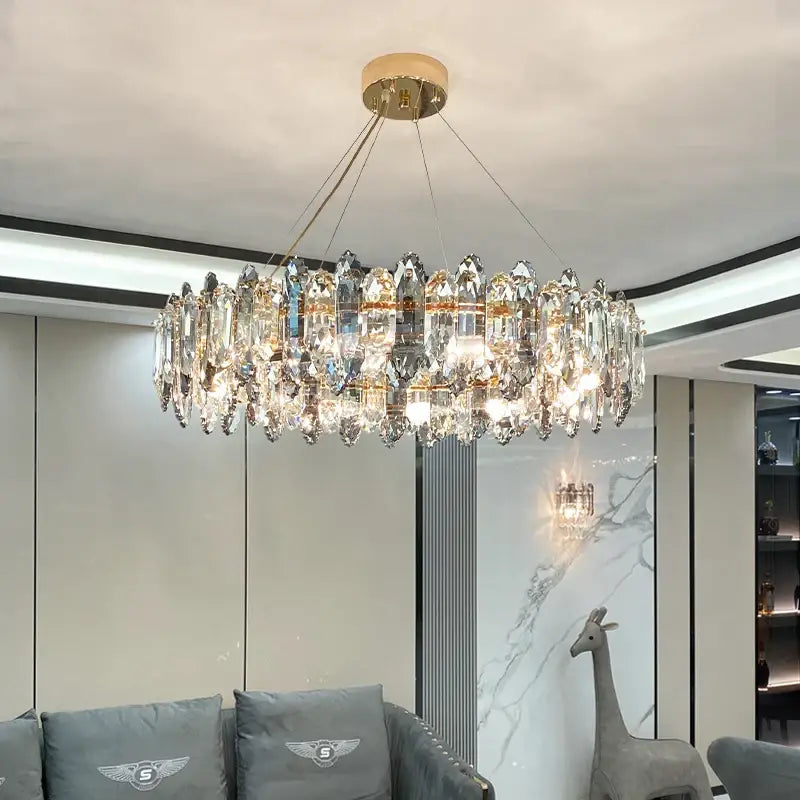 Decorbites crystal chandelier with gold ceiling mount and clear faceted crystals in elegant nordic design