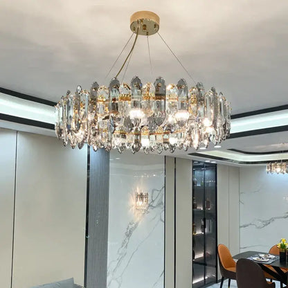 DecorBites crystal chandelier with gold-toned mount and clear faceted crystals in elegant Nordic design for living areas