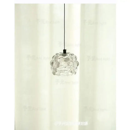 Clear glass decorbites crystal chandelier with textured bubble-like spherical design for clothing store cashier area